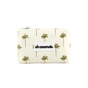 Small pouch with palm tree pattern and 'oh coconuts' label on a black background