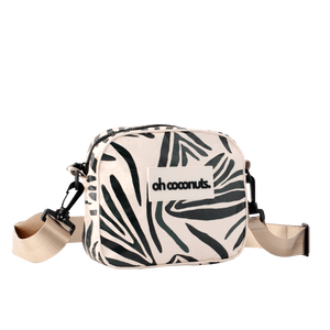 crossbody bag with fern pattern and beige strap