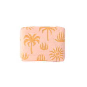 pink and mustard palm tree pattern on beach pouch