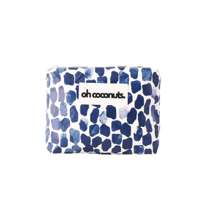 Blue and white patterned pouch with 'oh coconuts' label on a white background