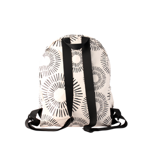 Travel back pack with geometric pattern in black and cream