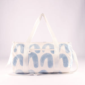Wipe clean water resistant material multiple pocket and zips, crossbody strap gym and duffel bag. 