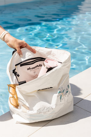 The everything tote born in Noosa Heads with palm tree zip and multiple pockets. 