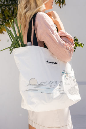 The everything beach bag with palm tree and mountain design